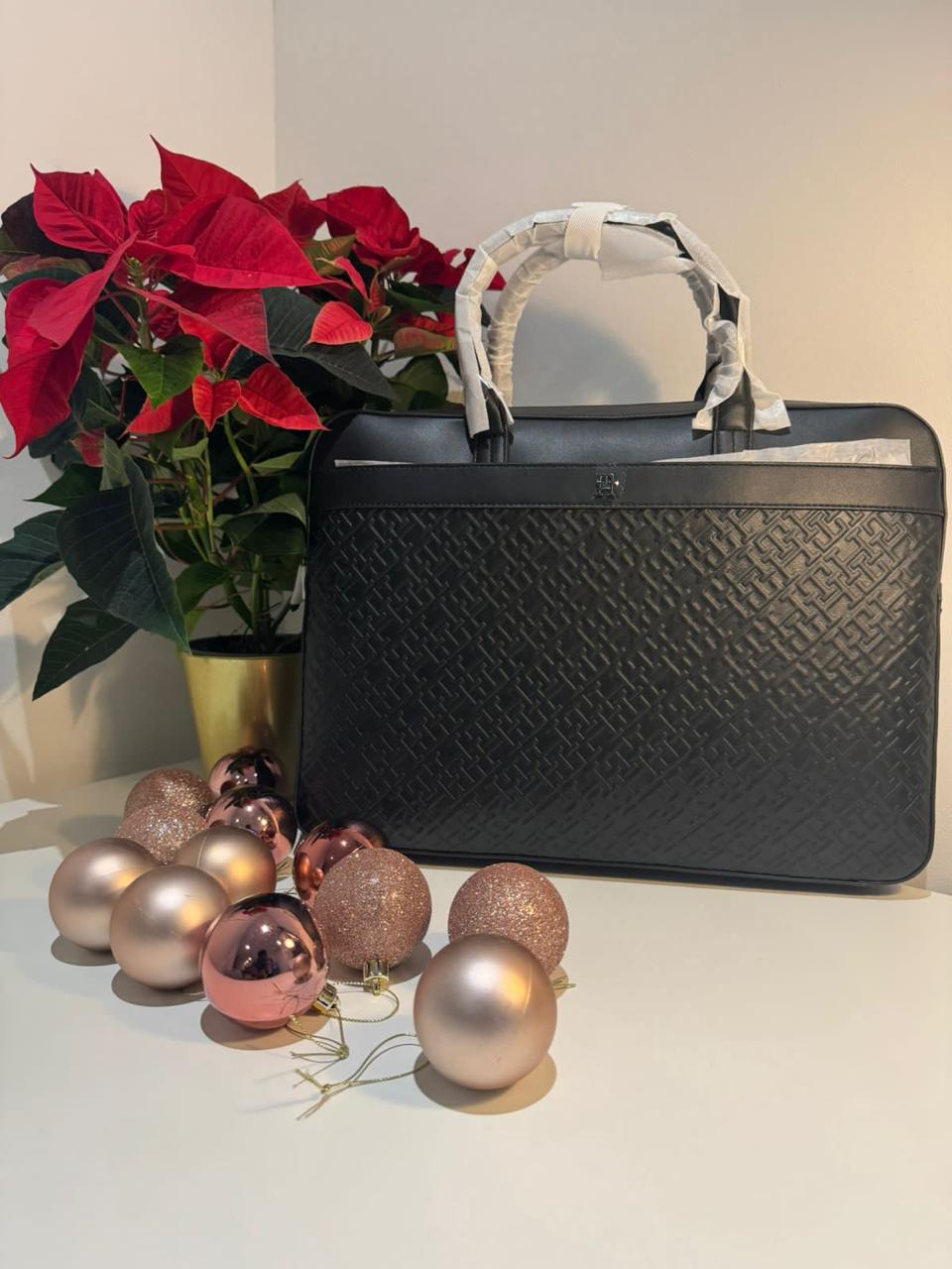 Tommy Hilfiger monogram-embossed laptop bag