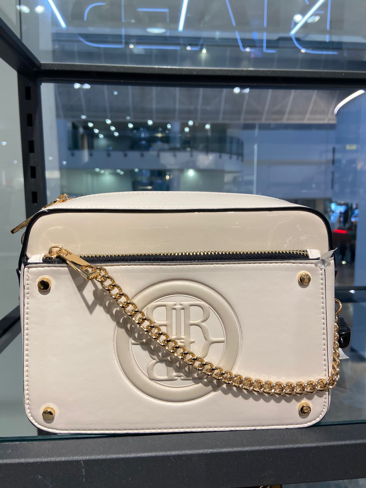 River Island embossed chain cross body bag in cream