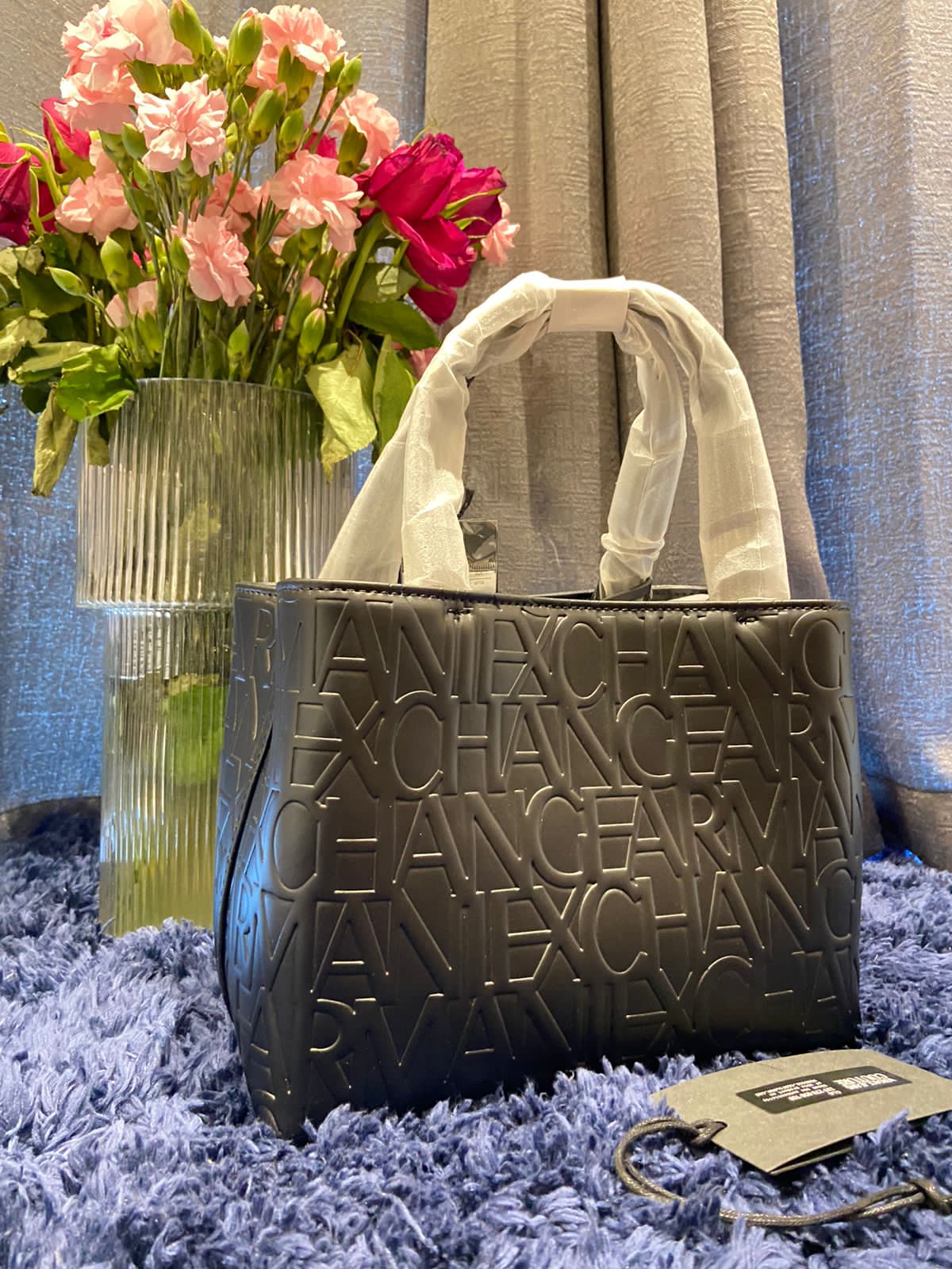 ARMANI EXCHANGE  Share Add to Wish List Shopper with all-over embossed logo lettering